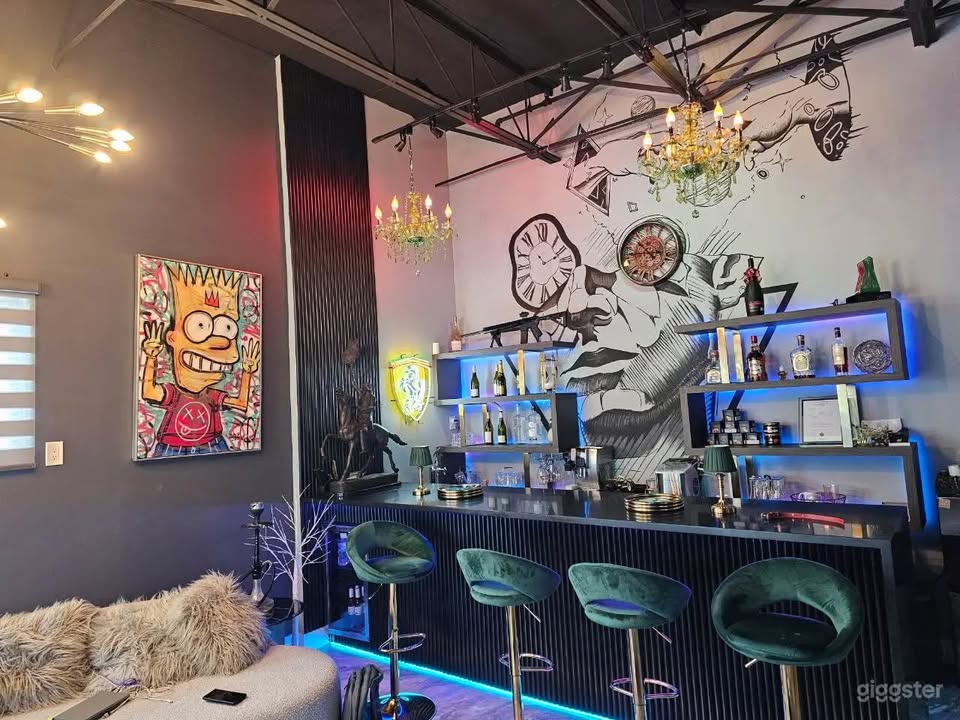 Full bar and lounge with mural wall